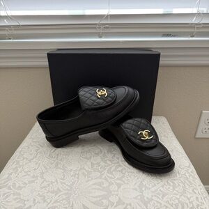 Chic Black Loafers with Gold Accent
Designer inspired